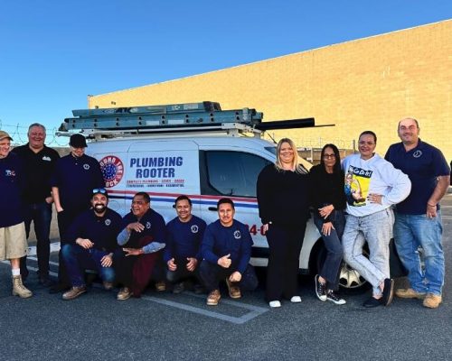 ATC Plumbing and Rooter’s team of plumbing emergency specialists standing in front of their service van in Los Angeles, ready to provide quick and reliable solutions.